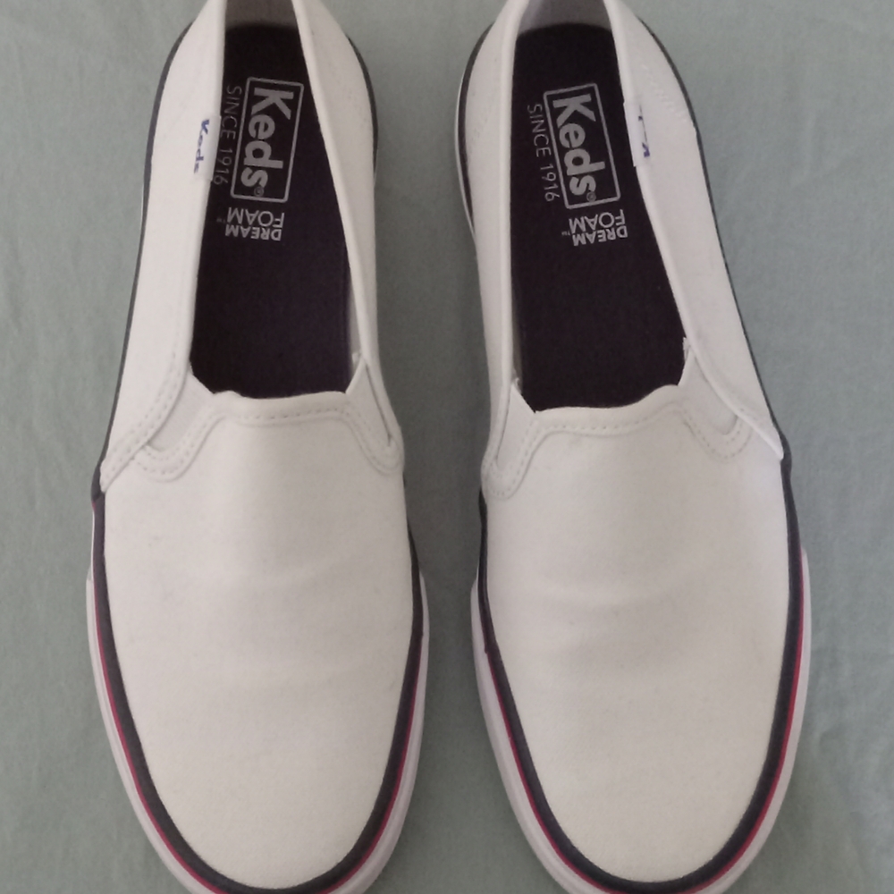 Keds Women's White and Black Slip-On Sneakers